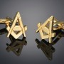 Gold cufflinks with Masonic symbol
